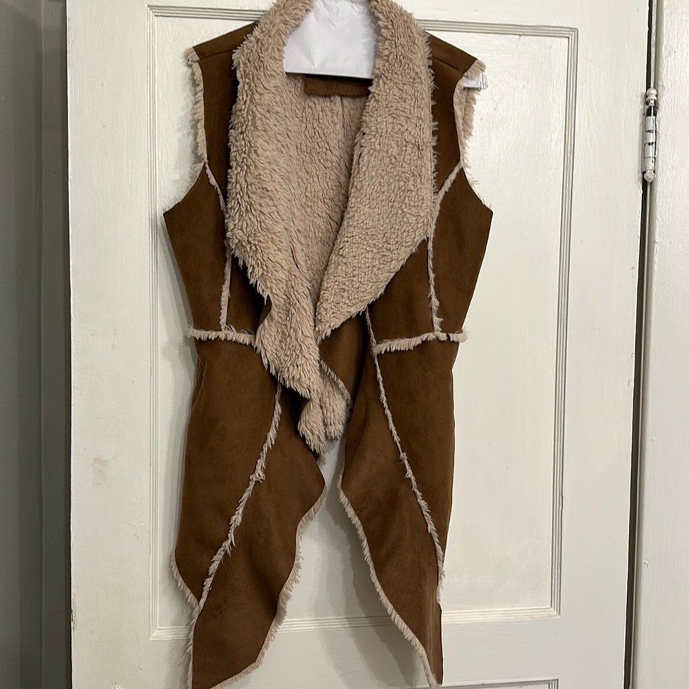 Shearling vest. Size medium. Super comfortable and warm.